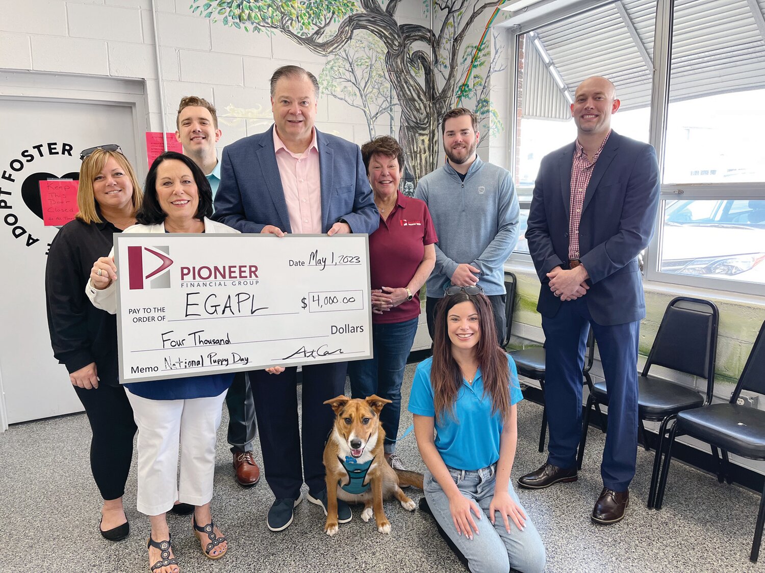 Tammy Gallo Executive Director of Heart of RI received the donation from Arthur Colello from Pioneer Financial along with Gail, Katlyn and John Colello. As well as Stacy Guenette, Michael Toole and Erik Johnson. Plus, their family pup Rosco Colello!